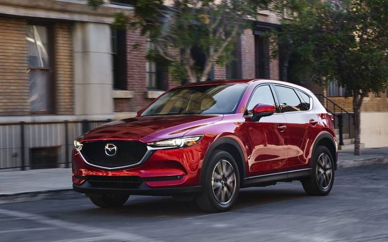mazda cx 5 touring vs grand touring 2020